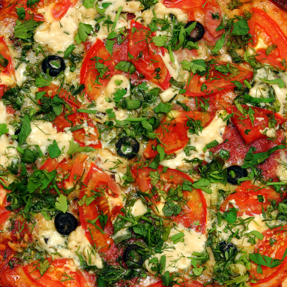 Pizza With Tomatoes And Greens